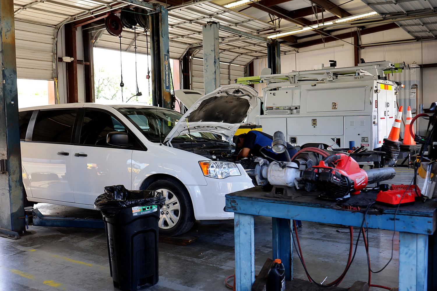A van being serviced in one of the bays